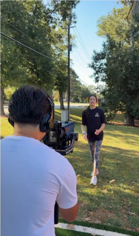 Thrivr videographer filming a CBA Sports Meta ad on location in Georgia